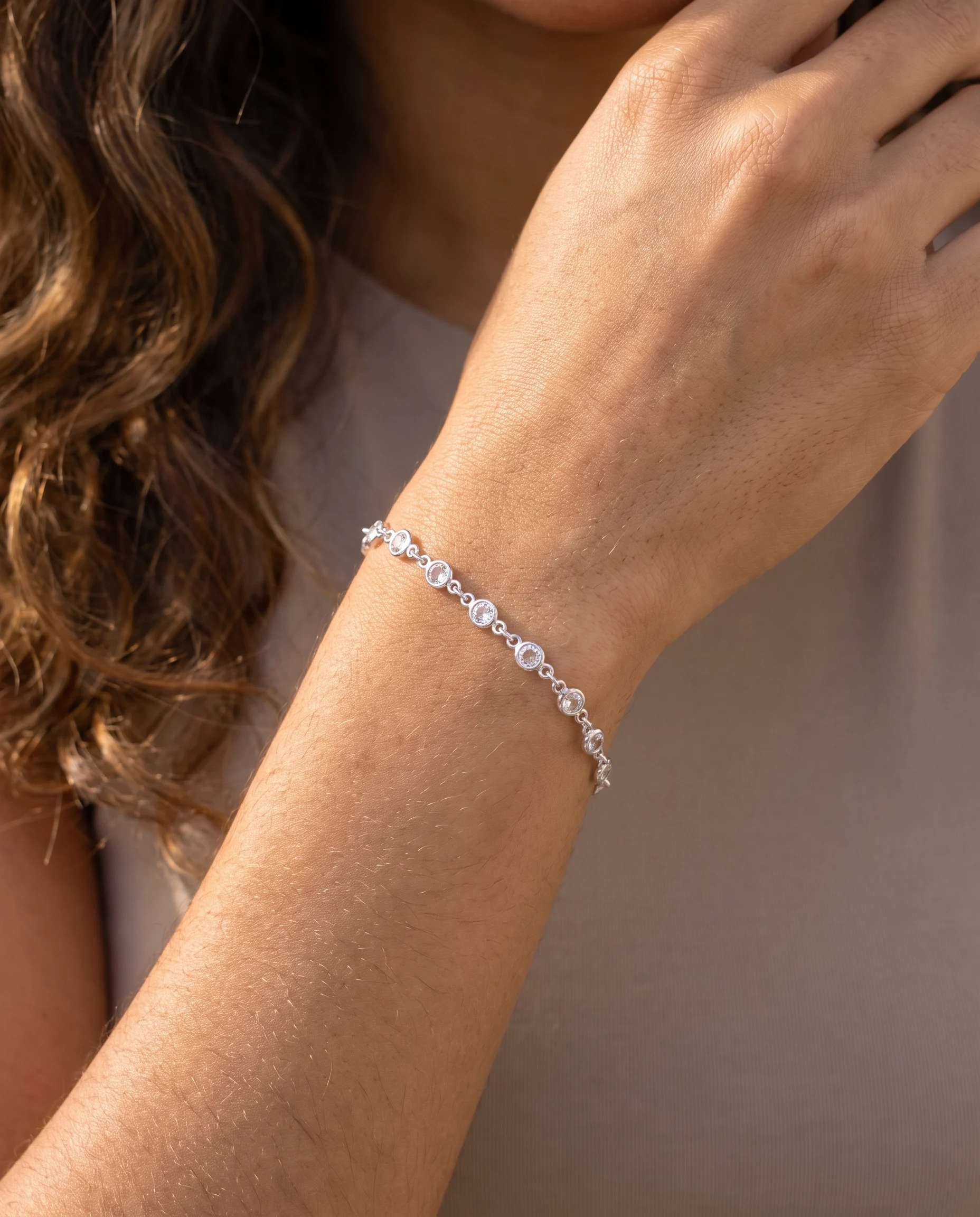 Round Points of Light Bracelet, Silver Finish, worn on the wrist, close-up
