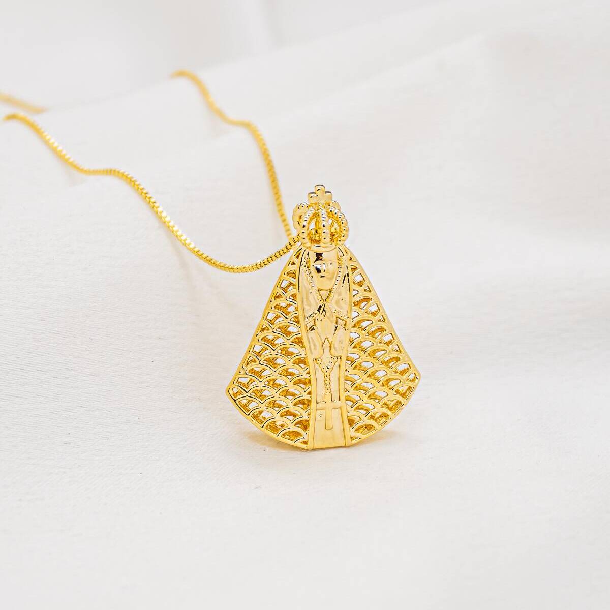 Gold necklace with large crowned Virgin pendant, openwork scale cloak