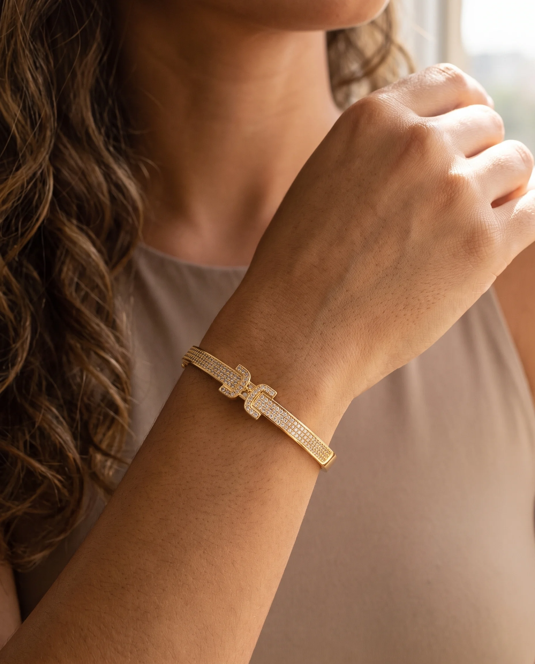 Crystal-Set Bangle with Central Pavé Belt Clasp, Worn on Wrist, Close-Up